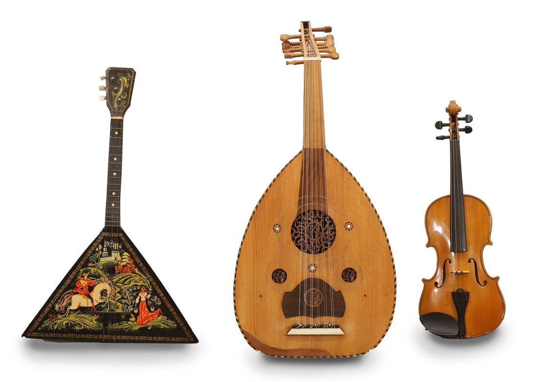 A selection of musical instruments,: A selection of musical instruments, comprising an oud, a painted balalaika and a Stentor Student II violin, (3 instruments with a case for the violin) 3