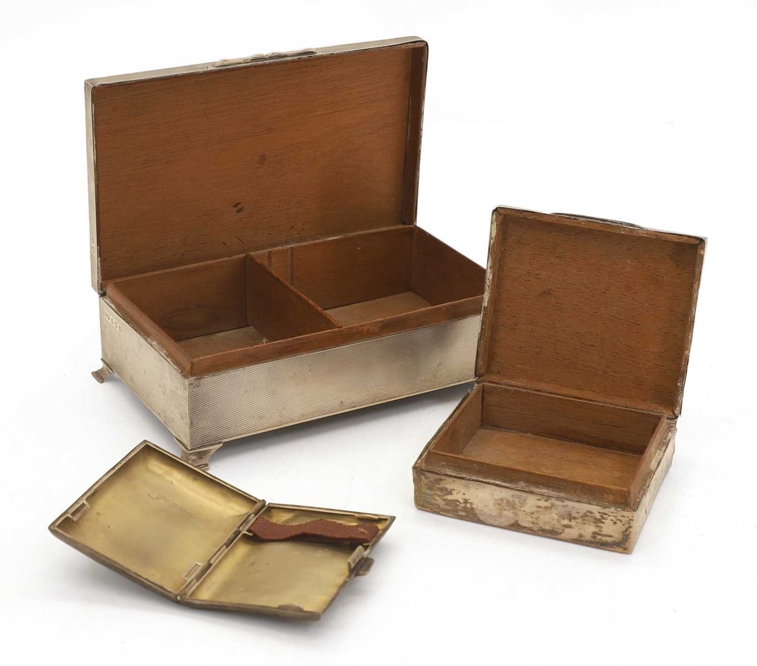 A silver cigarette case and two other similar, - 2