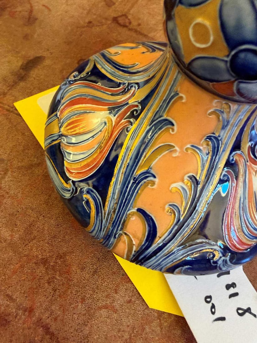 A Moorcroft Macintyre vase, - 9