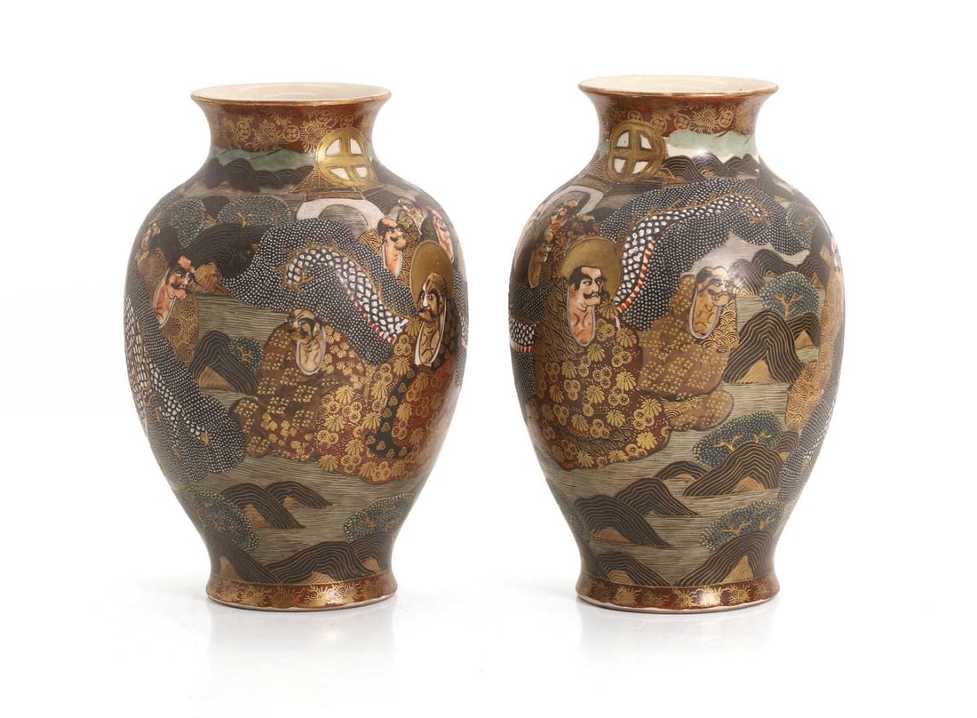 A pair of Japanese Satsuma vases,: A pair of Japanese Satsuma vases, with 1000 faces designed to the main body, with painted character mark to the bases 12cm wide, 18cm high 2 Condition Report: Some marks to the surface and crazing to