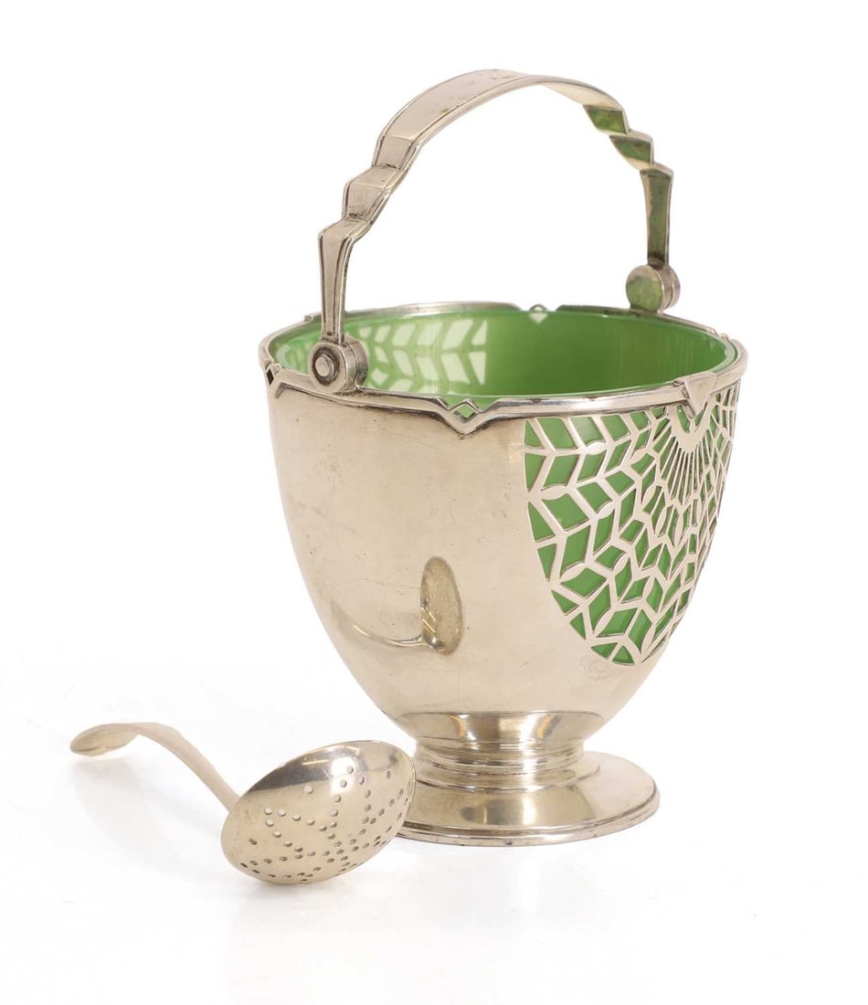 A silver ladled basket with pierced spoon, - 2