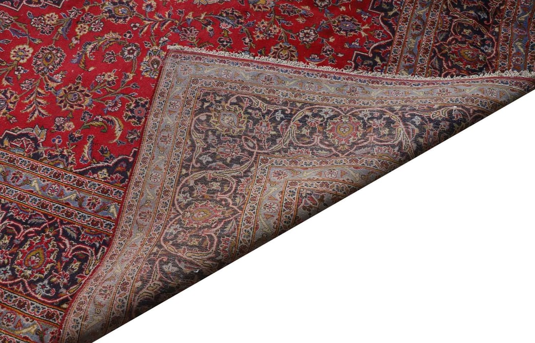 A large red ground carpet, 20th century, - 2