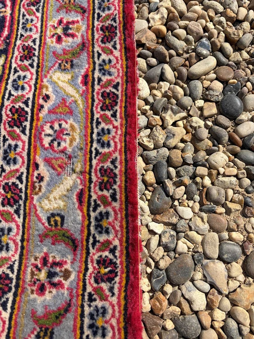 A large red ground carpet, 20th century, - 3