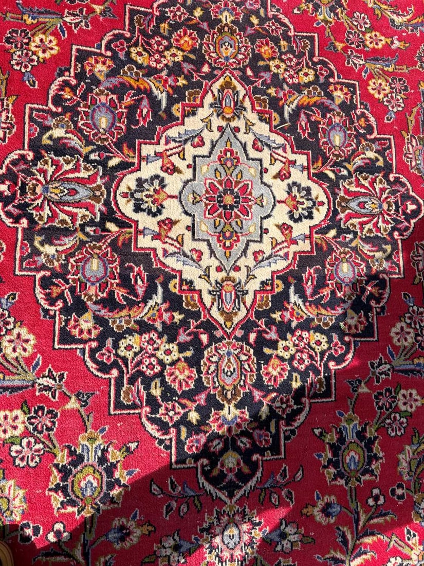 A large red ground carpet, 20th century, - 5