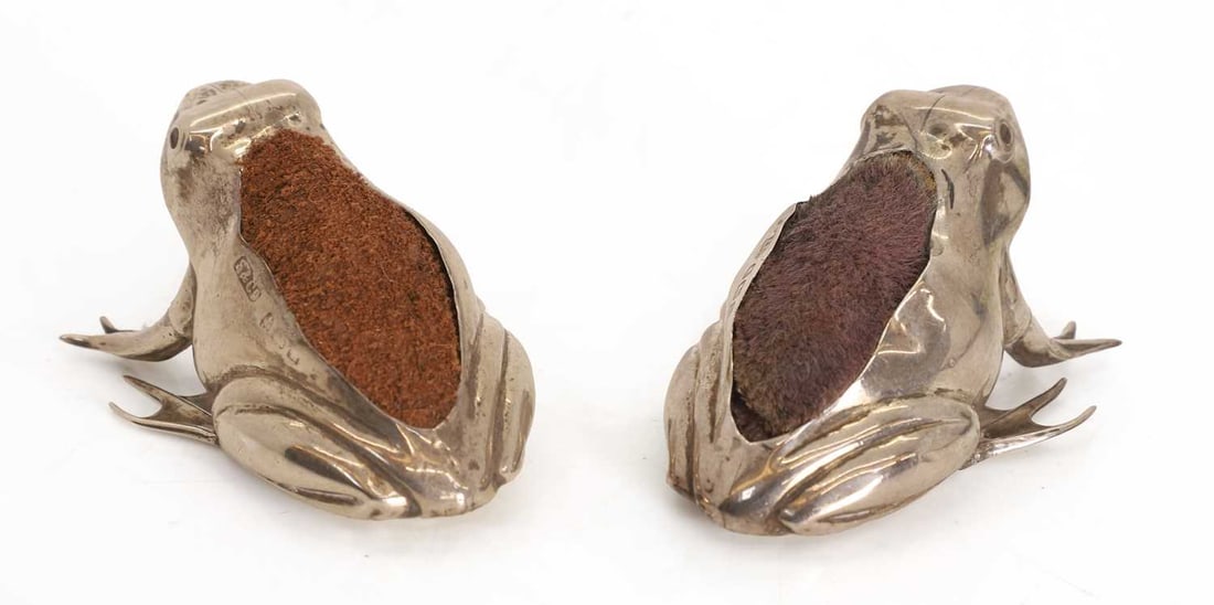 A pair of novelty silver pin cushions or pen wipes, marks worn, early 20th century, - 2