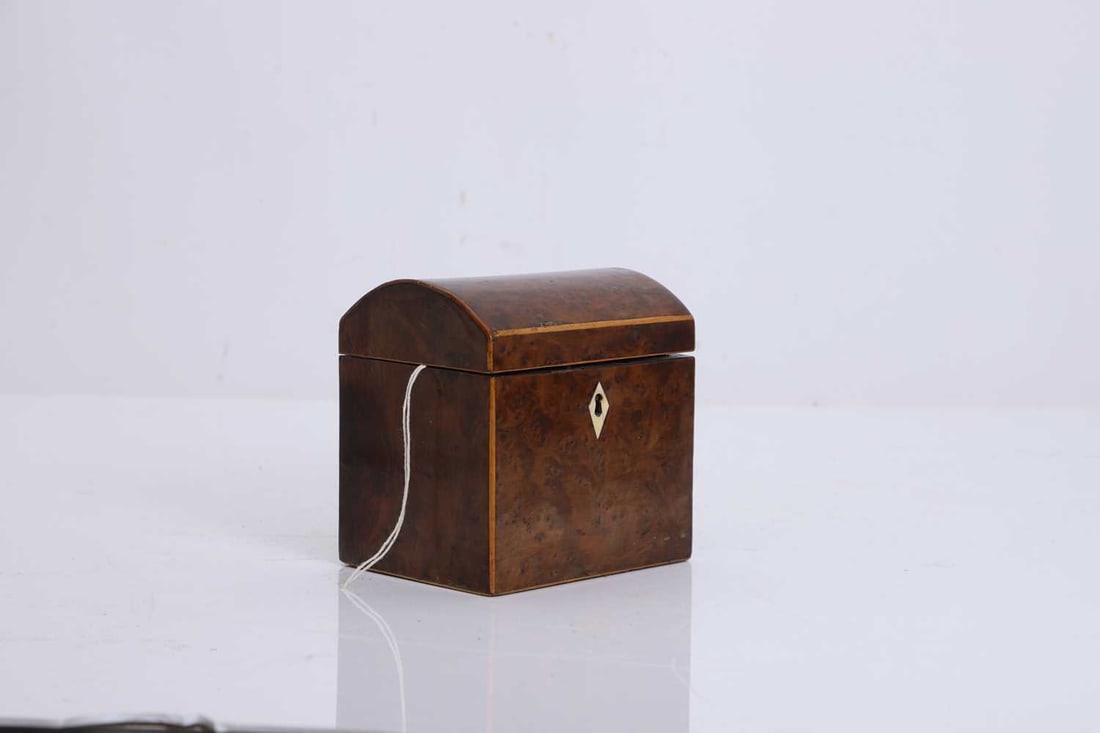 A small burr yew tea caddy, - 7
