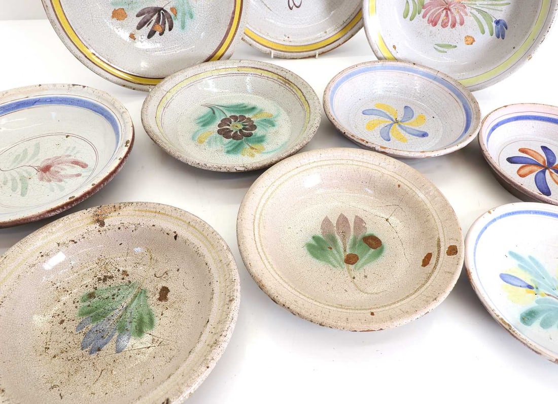 A collection of French majolica-style plates 18th and 19th century, - 2