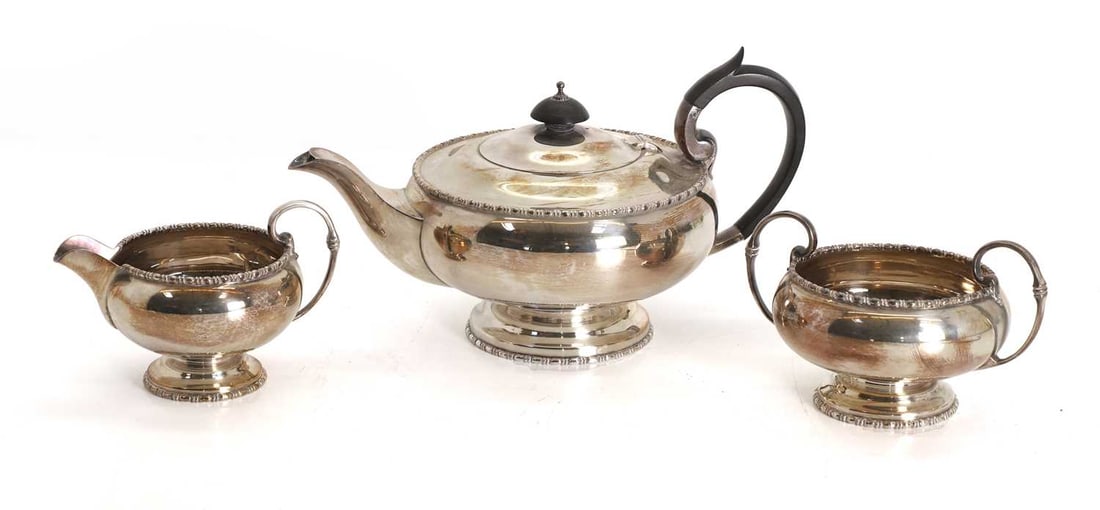 A silver three-piece tea set, (1 of 2)