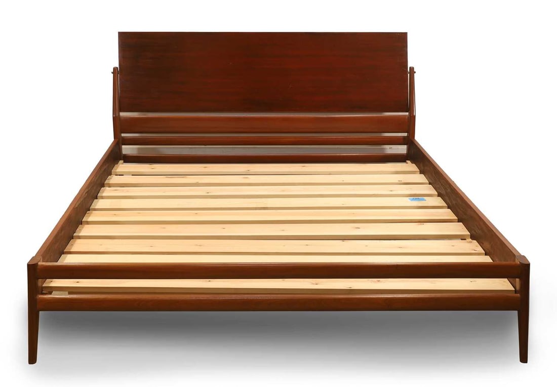 A Silvio Cavatorta teak double bed, 1950s,: A Silvio Cavatorta teak double bed, 1950s, of brass slip joint construction, with centre slats 170cm wide, 208cm long Condition Report: Marks and knocks.