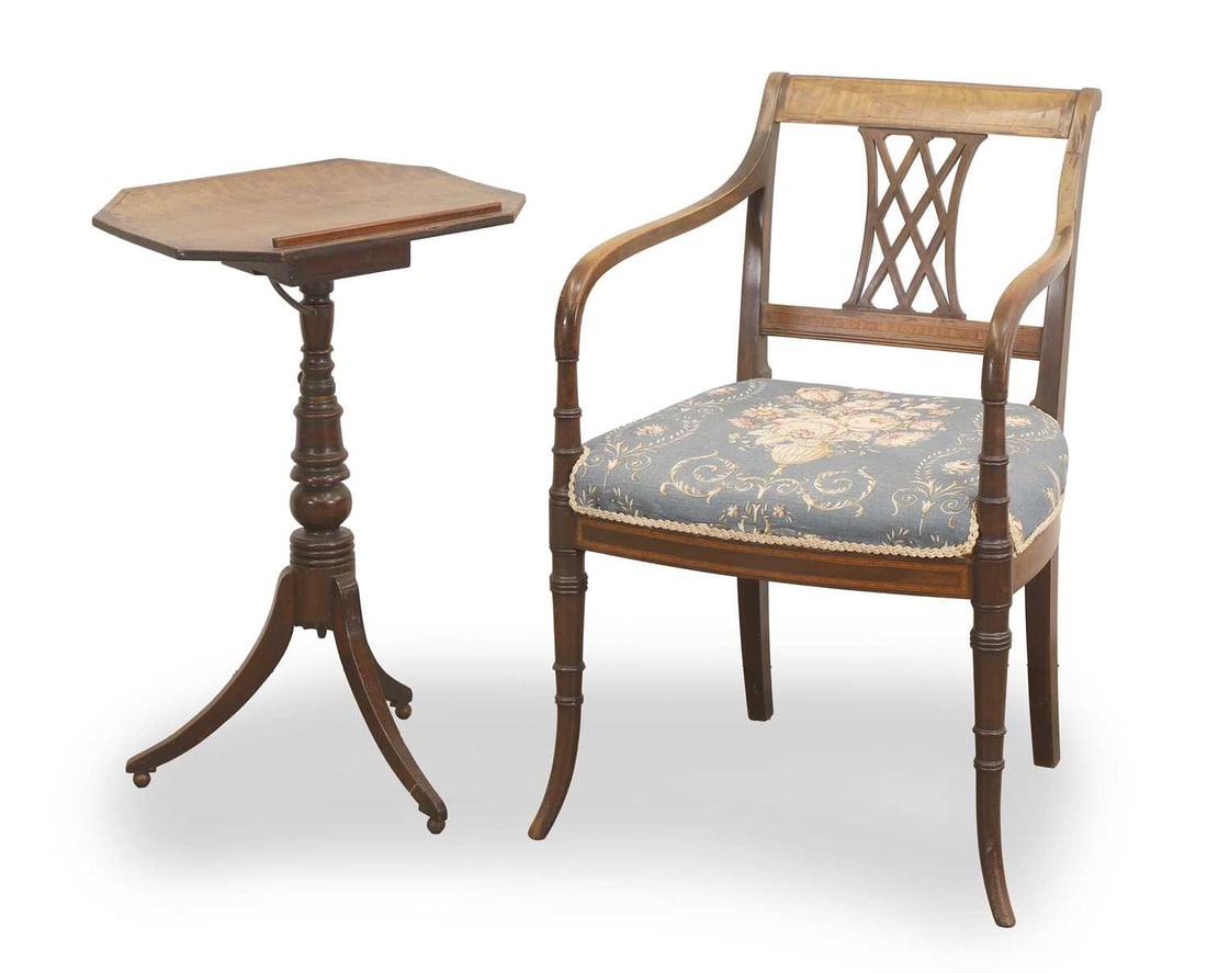 A Regency mahogany bar back elbow dining chair, circa 1820,: A Regency mahogany bar back elbow dining chair, circa 1820, inlaid, with central pierced vertical splat, together with a Regency mahogany reading table the chair 52cm wide, 50cm deep, 83cm high 2
