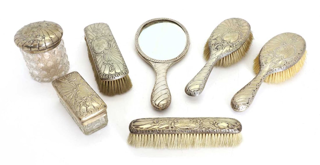 A German seven piece 800 standard silver backed and mounted dressing table set, (1 of 2)