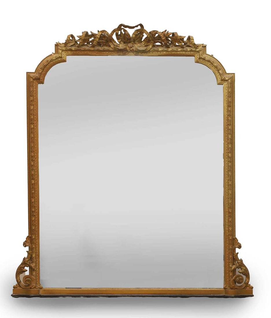 A Victorian gilt gesso overmantel mirror,: A Victorian gilt gesso overmantel mirror, the crest with ribbon swags decorated with laurel leaves, over a scrolled frame and shaped mirror plate 122cm wide, 160cm high Condition Report: Some cracking
