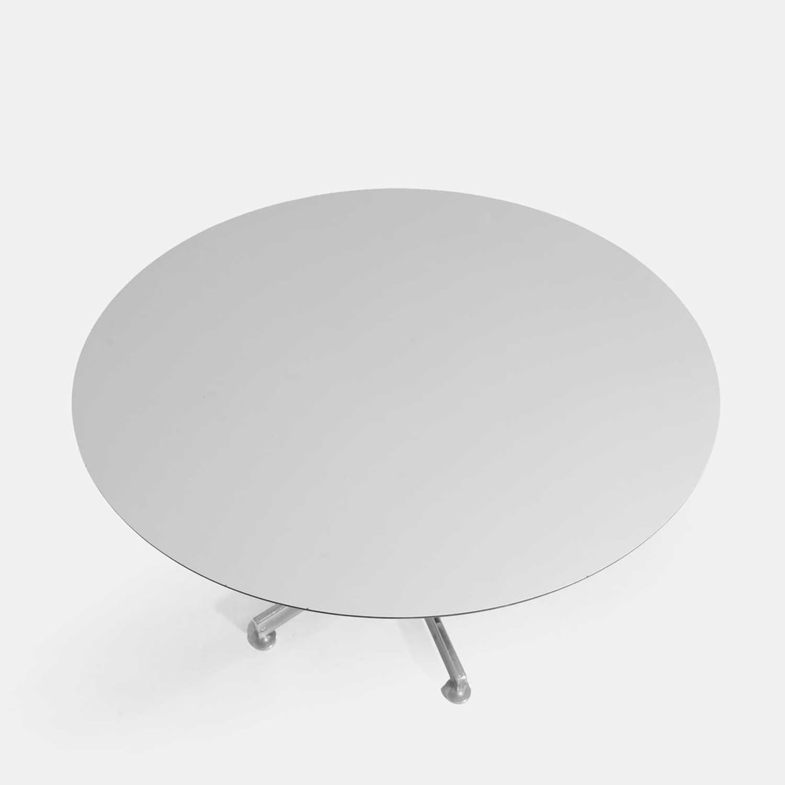 Manner of Arne Jacobsen, a round table, - 2