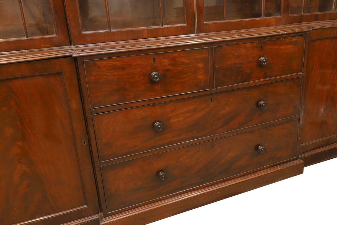 A mahogany breakfront bookcase, 19th century, - 2