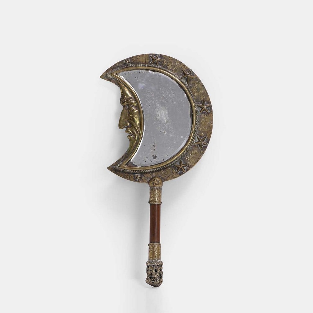 A crescent moon hand mirror, late 19th century, (1 of 2)