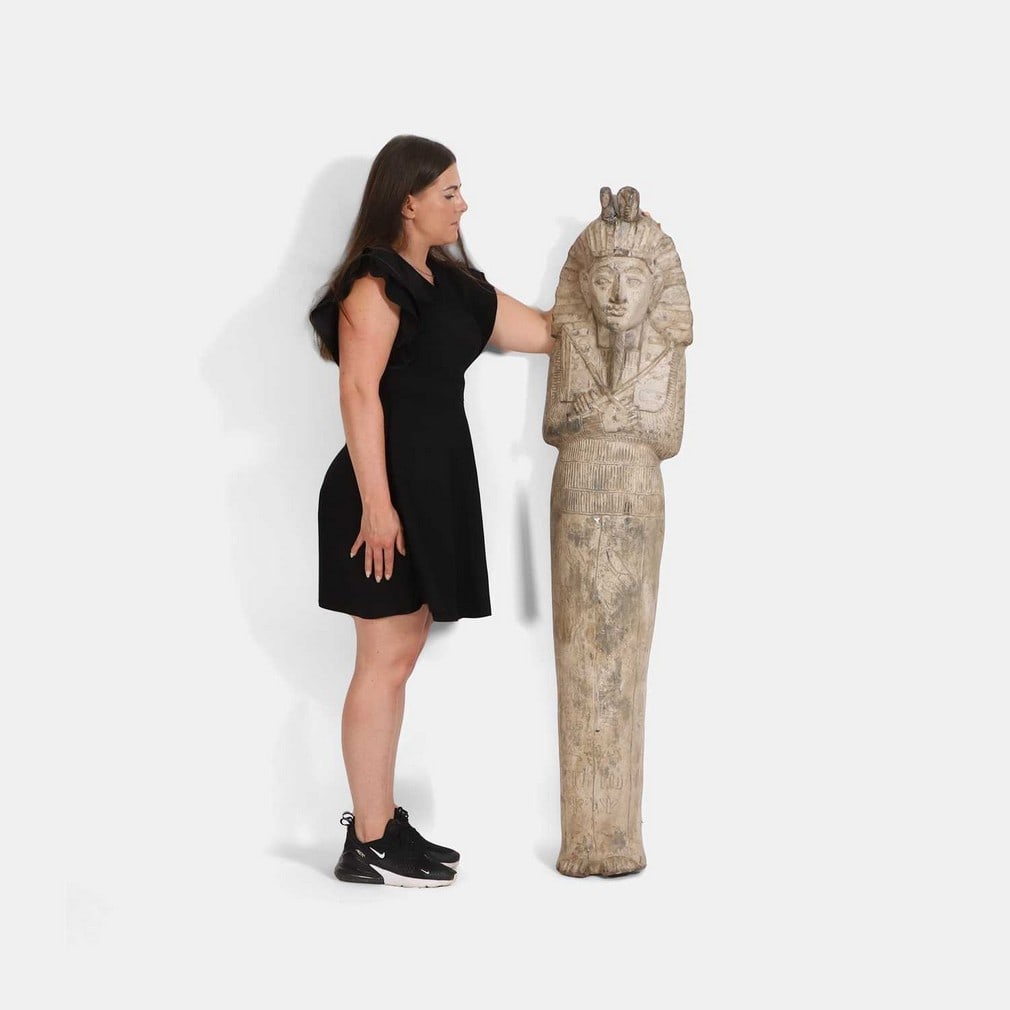 A carved and painted hardwood figure of the Egyptian God Osiris, 19th century,: A carved and painted hardwood figure of the Egyptian God Osiris, 19th century, the God of the Afterlife, the Dead, Resurrection, Fertility and Agriculture, modelled standing, in mummified form as a Ki
