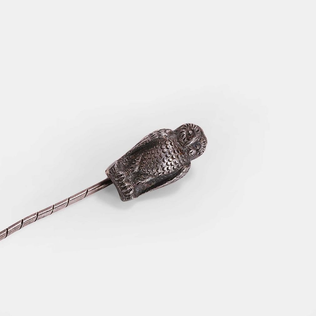 A Victorian owl stick pin, late 19th century, (1 of 3)