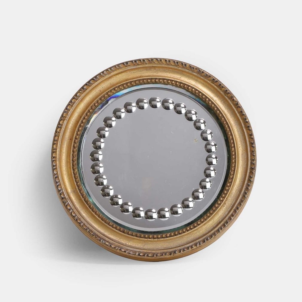 A Victorian sorcerer's mirror, late 19th century, (1 of 2)