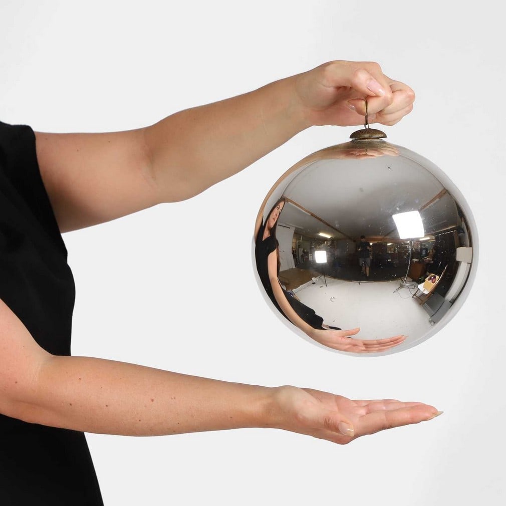 A rare silver mercury glass spherical witch's ball, 19th century, (1 of 2)