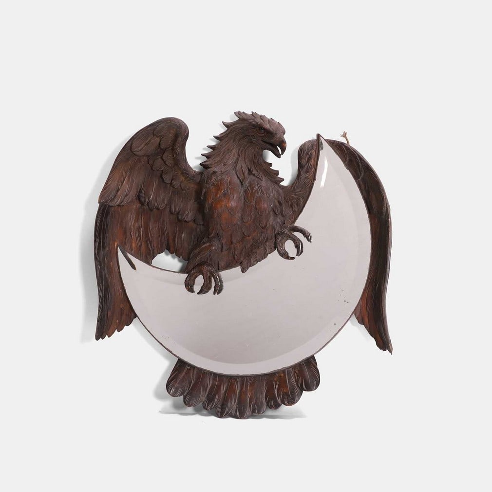 A carved eagle mirror, late 19th century, (1 of 2)