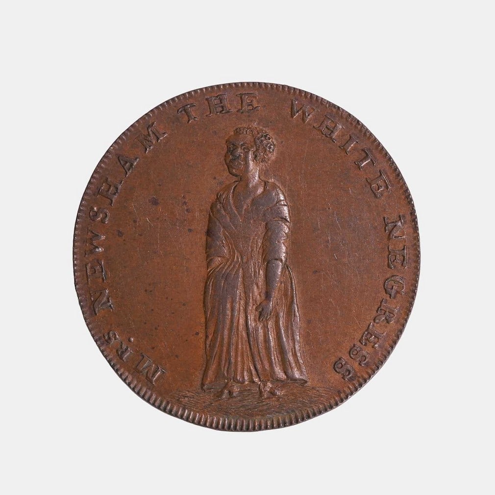 A Mrs Newsham 'The White Negress' halfpenny token, 1795, (1 of 2)