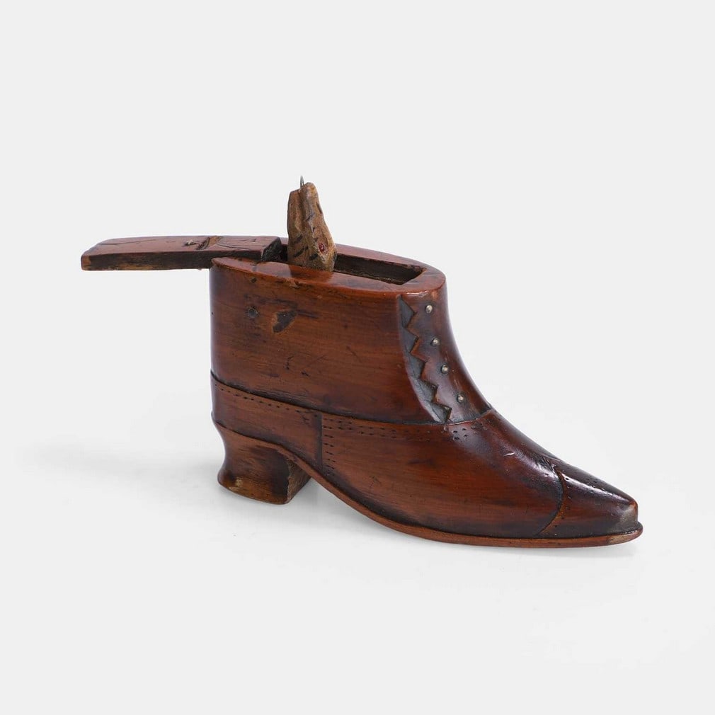 A 'Snake in your Boot' surprise trick novelty, late 19th century, (1 of 2)