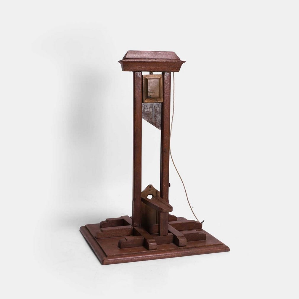 A novelty guillotine cigar cutter, mid-20th century, (1 of 2)