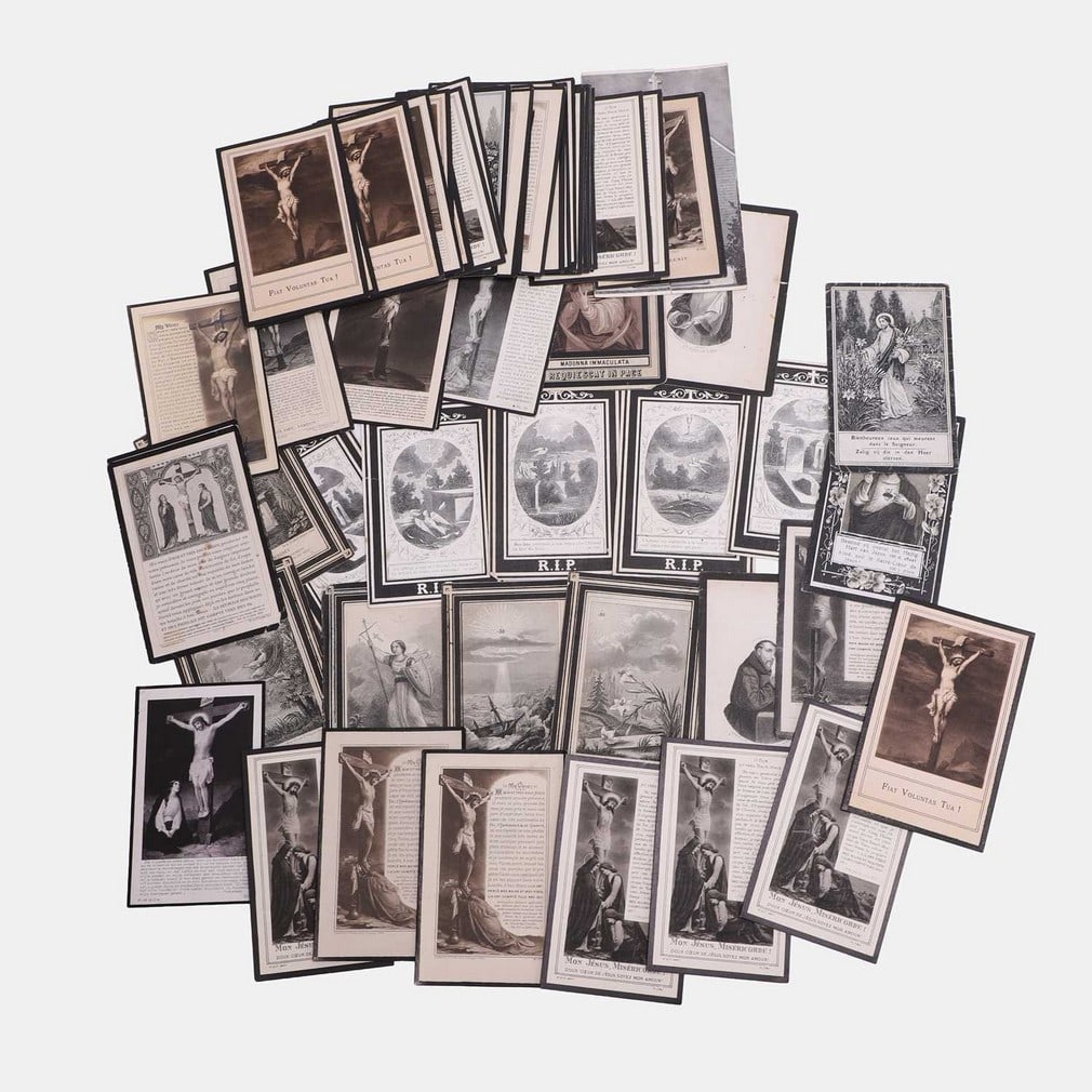 A collection of seventy-eight French funeral and church cards, 19th and 20th century,: A collection of seventy-eight French funeral and church cards, 19th and 20th century, including ‘A Repose for the Dead’, various illustrated designs (11 x 7.5cm) (78) Condition Report: Min