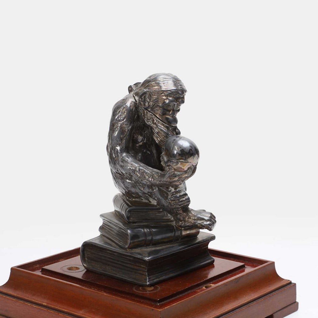 A novelty spelter lighter, early 20th century, (1 of 3)