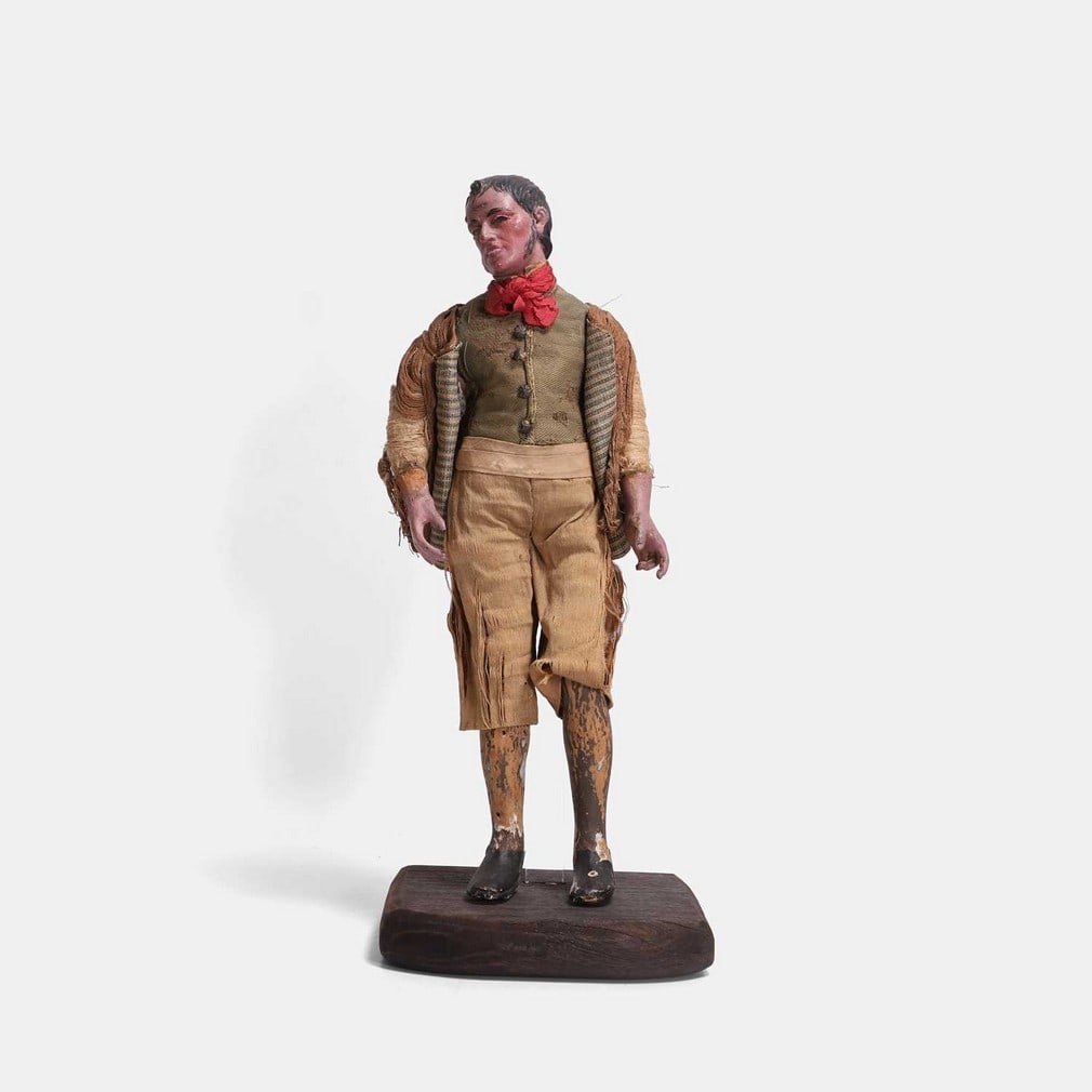 An Italian nativity figure of a man, late 18th or early 19th century, probably from Naples, (1 of 2)