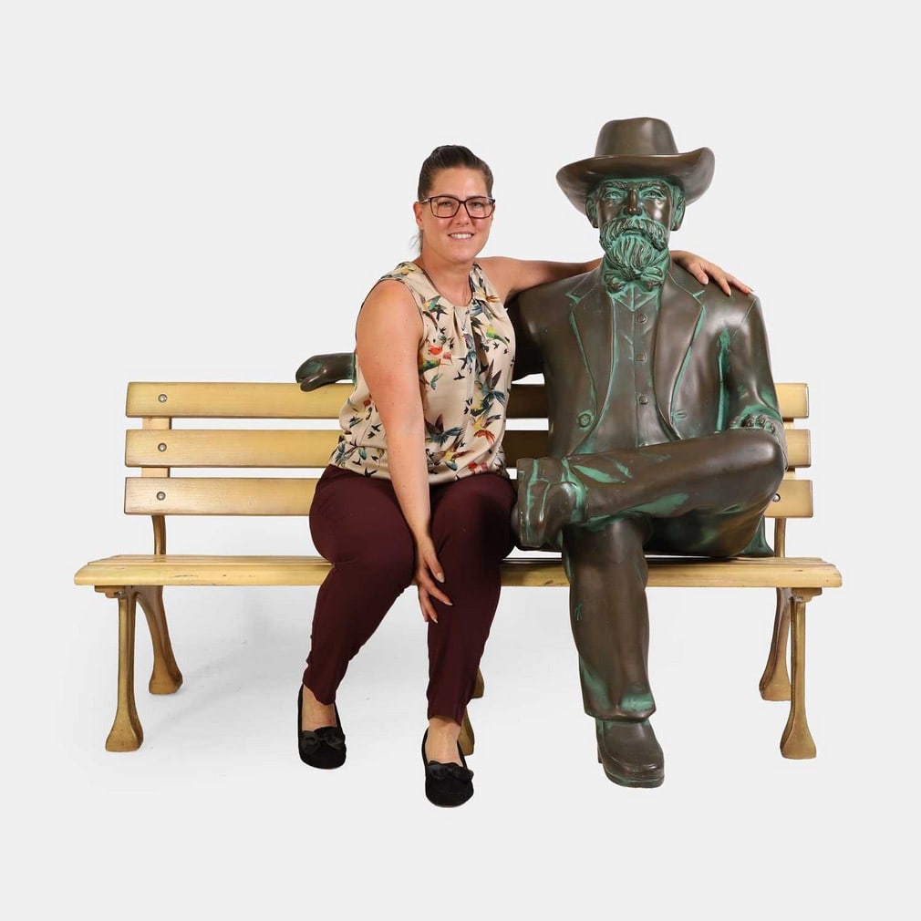 Jack Daniel seated on a bench, late 20th century, (1 of 4)