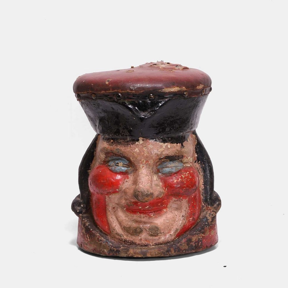 An unusual folk art mask-head stool, late 19th or early 20th century, (1 of 2)