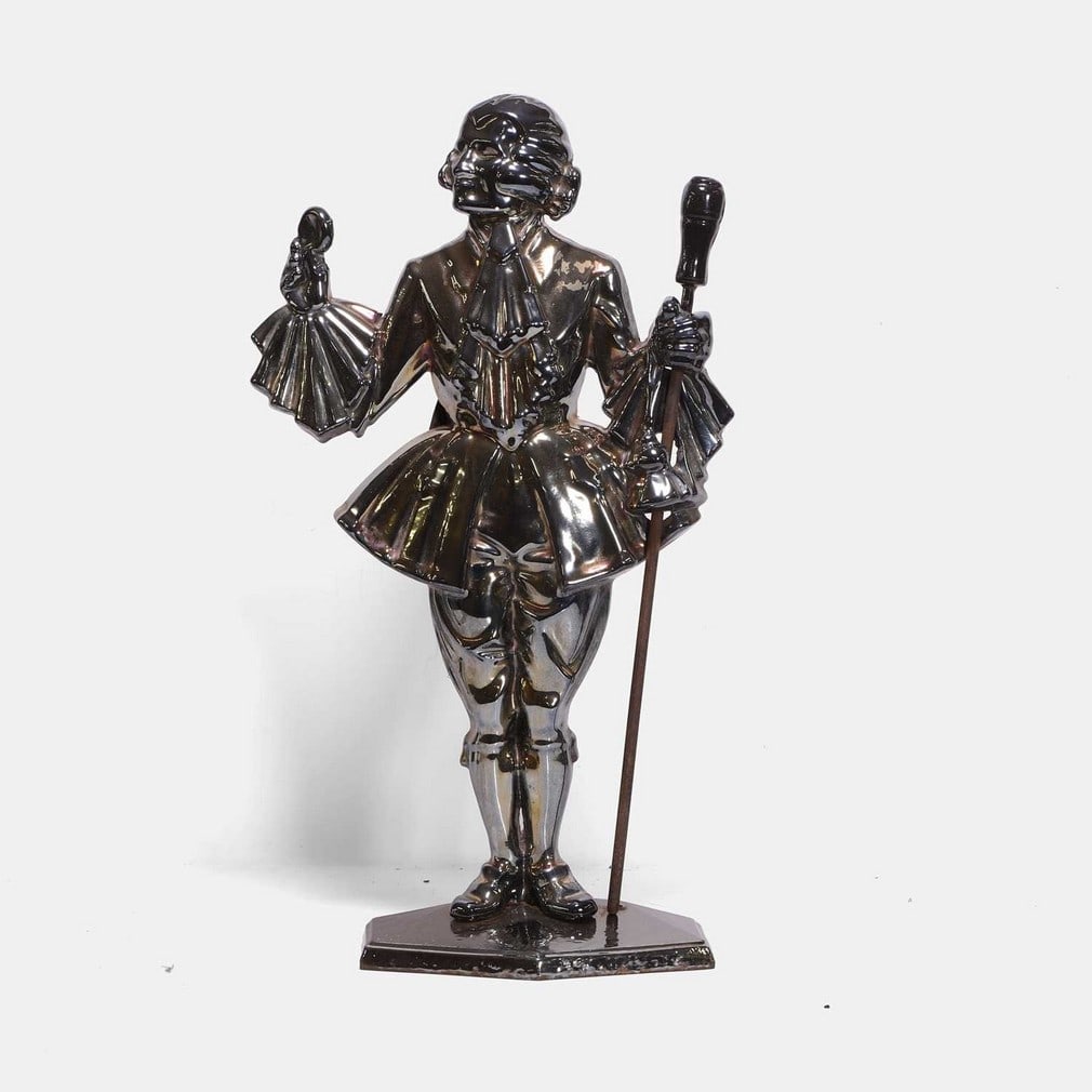 A fireplace dandy, 20th century, (1 of 2)