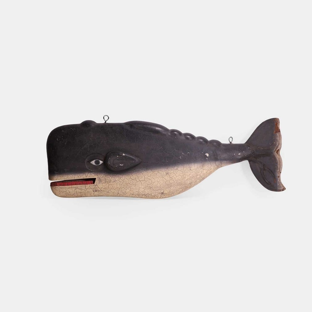 A folk art whale trade sign, 20th century,: A folk art whale trade sign, 20th century, a large metal sign, with two suspension rings (97cm long, 32cm high) Condition Report: Some rust patches, and other knocks and scratches,