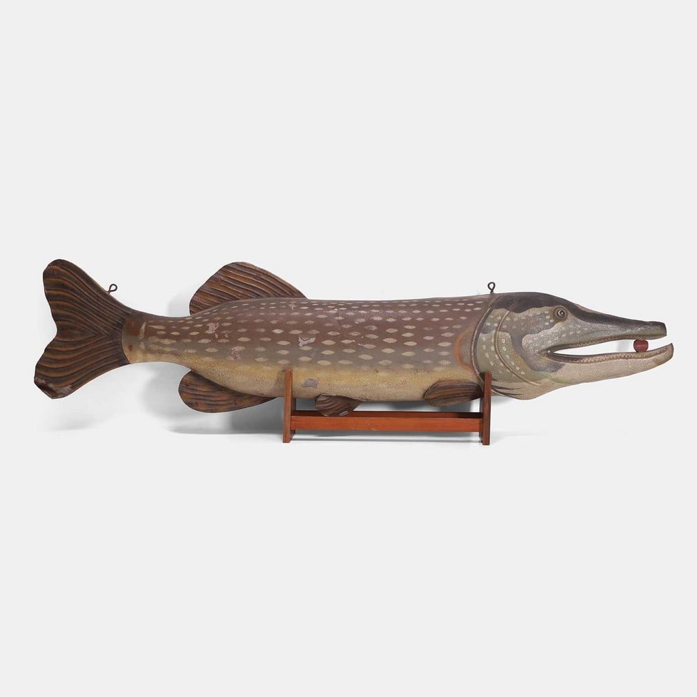A French toleware painted Pêcher shop sign, circa 1900,: A French toleware painted Pêcher shop sign, circa 1900, in the form of a pike, with two suspension loops and a wooden stand (125cm wide, 29cm deep, 34cm high overall on stand) (2) Provenance:: Fr