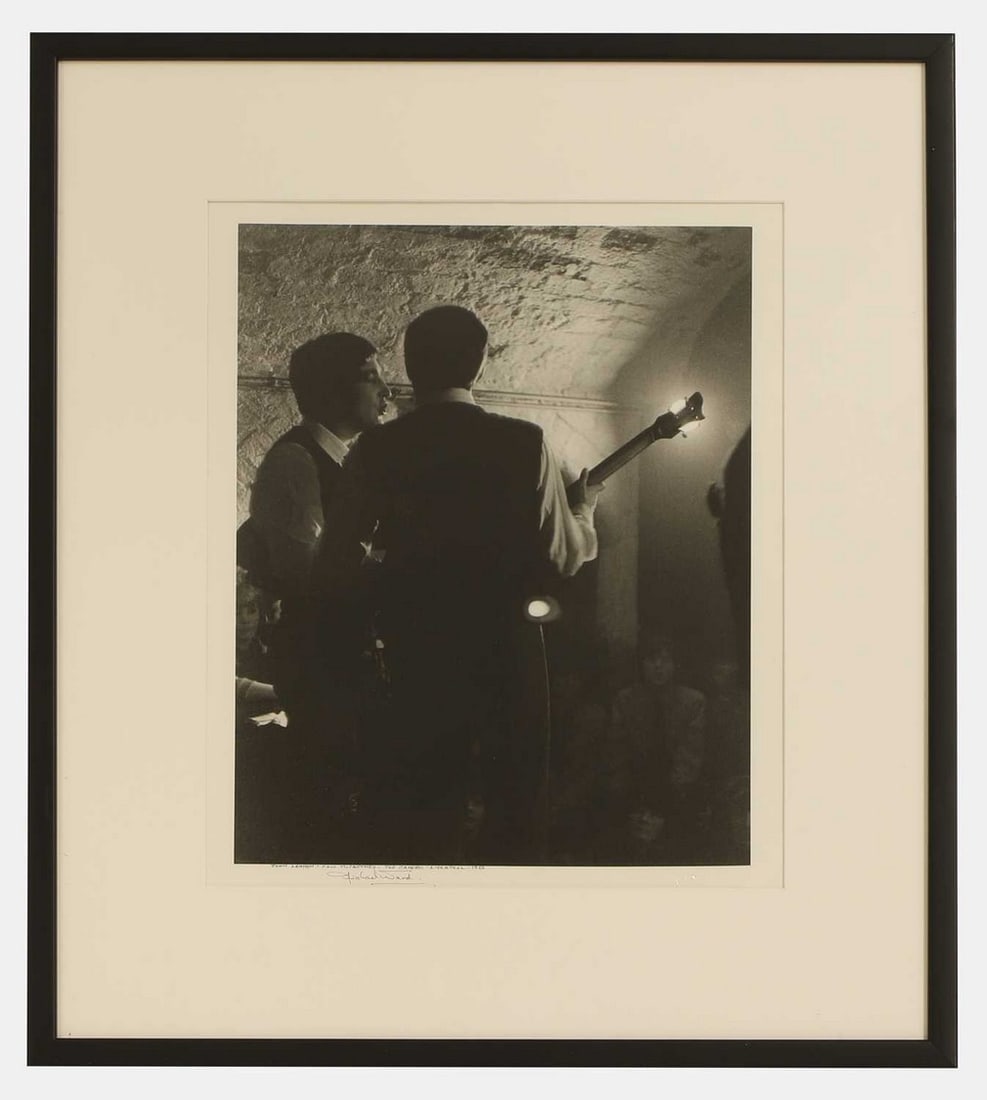 ▲ Michael Ward (British, 1929-2011) John Lennon and Paul McCartney, The Cavern, Liverpool,: ▲ Michael Ward (British, 1929-2011) John Lennon and Paul McCartney, The Cavern, Liverpool, 1963 an archival pigment print, printed later, signed 'Michael Ward', inscribed with title and a furthe