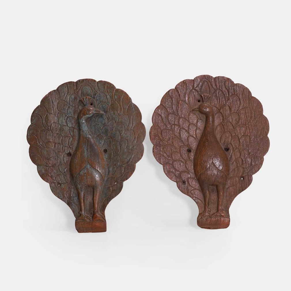 A pair of peacock wood plaques or wall appliqués, late 19th century, (1 of 2)