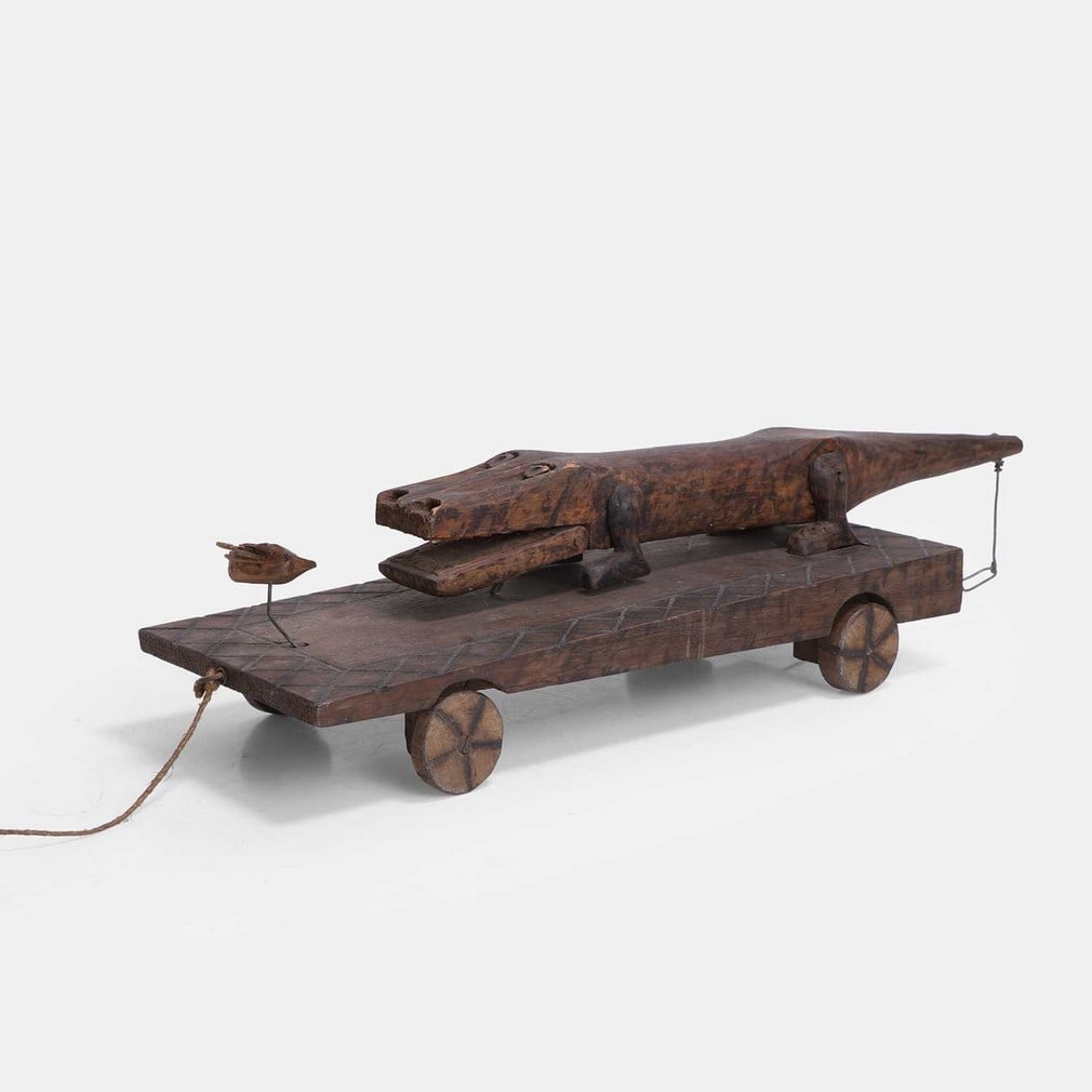 A folk art pull-along crocodile, early 20th century, African, (1 of 2)