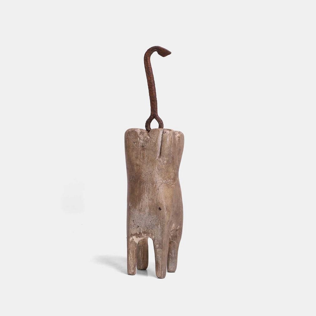 An American folk art dentist's shop sign, early 19th century,: An American folk art dentist's shop sign, early 19th century, carved and painted wood, with an original hook for suspension (tooth 6.5cm wide, 7cm deep, 31.5cm high) Condition Report: Fair, rusted hoo