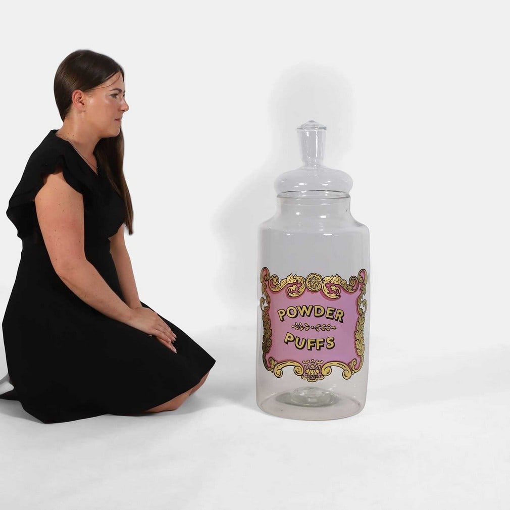 A Victorian apothecary 'Powder Puffs' clear glass jar and cover, circa 1900, (1 of 2)