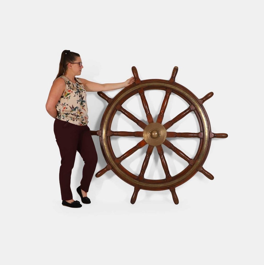 A massive mahogany and brass-mounted ship's wheel, late 19th century, (1 of 2)