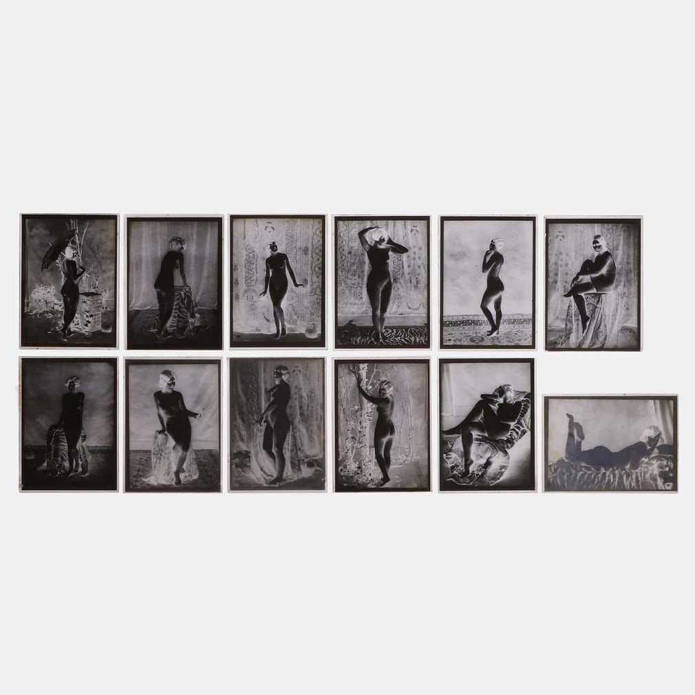 Twelve half-plate glass nude negative photographs, circa 1920s,: Twelve half-plate glass nude negative photographs, circa 1920s, some numbered in the negative, in two lidded card plate boxes (each 16 x 12cm) (12) Condition Report: Minor scratches, generally great c