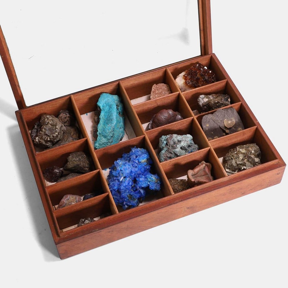 A Victorian mahogany box containing mineral samples, 19th century,: A Victorian mahogany box containing mineral samples, 19th century, with fourteen sections, each filled with minerals, including chrysocolla, pyrite, chalcanthite, cavansite, citrine quartz crystal, ch
