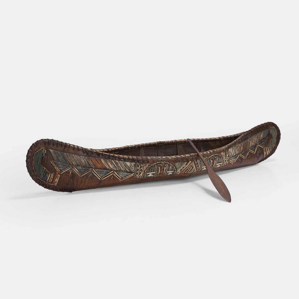 A porcupine quillworked birchwood model of a canoe, circa 1840, Mi'kmaq people, north-eastern (1 of 2)