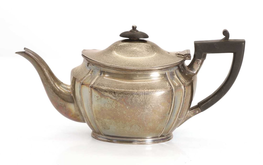 A silver teapot, (1 of 2)