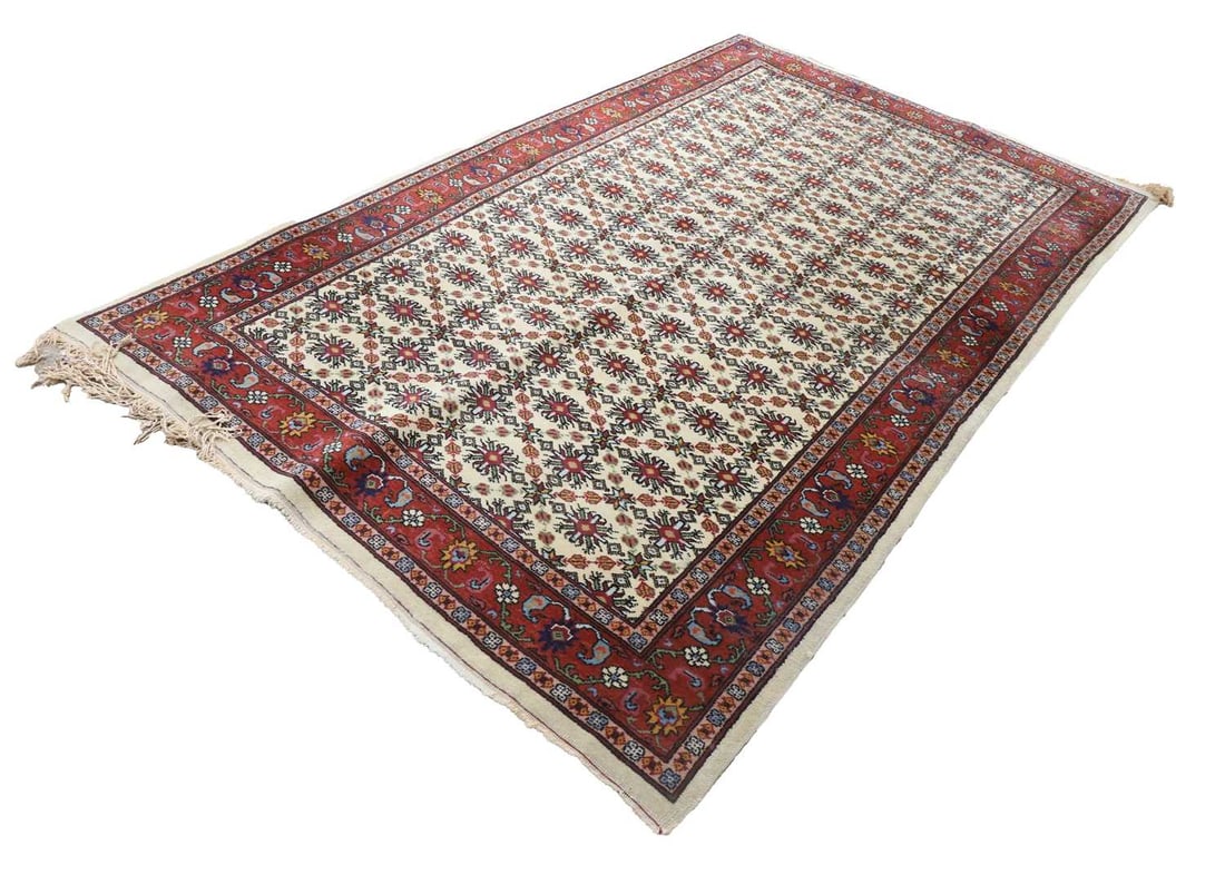 A Persian rug, (1 of 2)