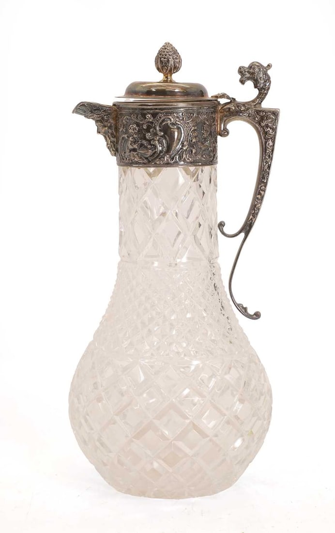An Elizabeth II silver mounted claret jug, (1 of 2)