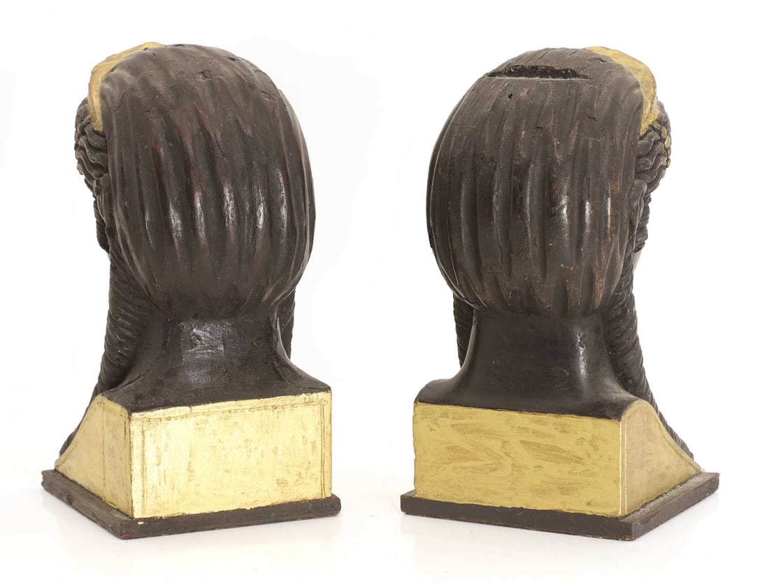 A pair of wooden Egyptian Revival sphinx-head bookends late 19th century, - 2