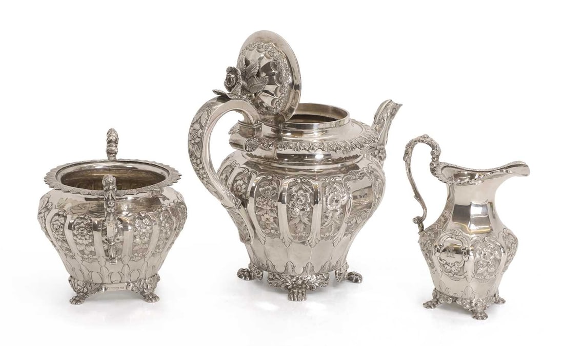 A matched silver tea set, - 2