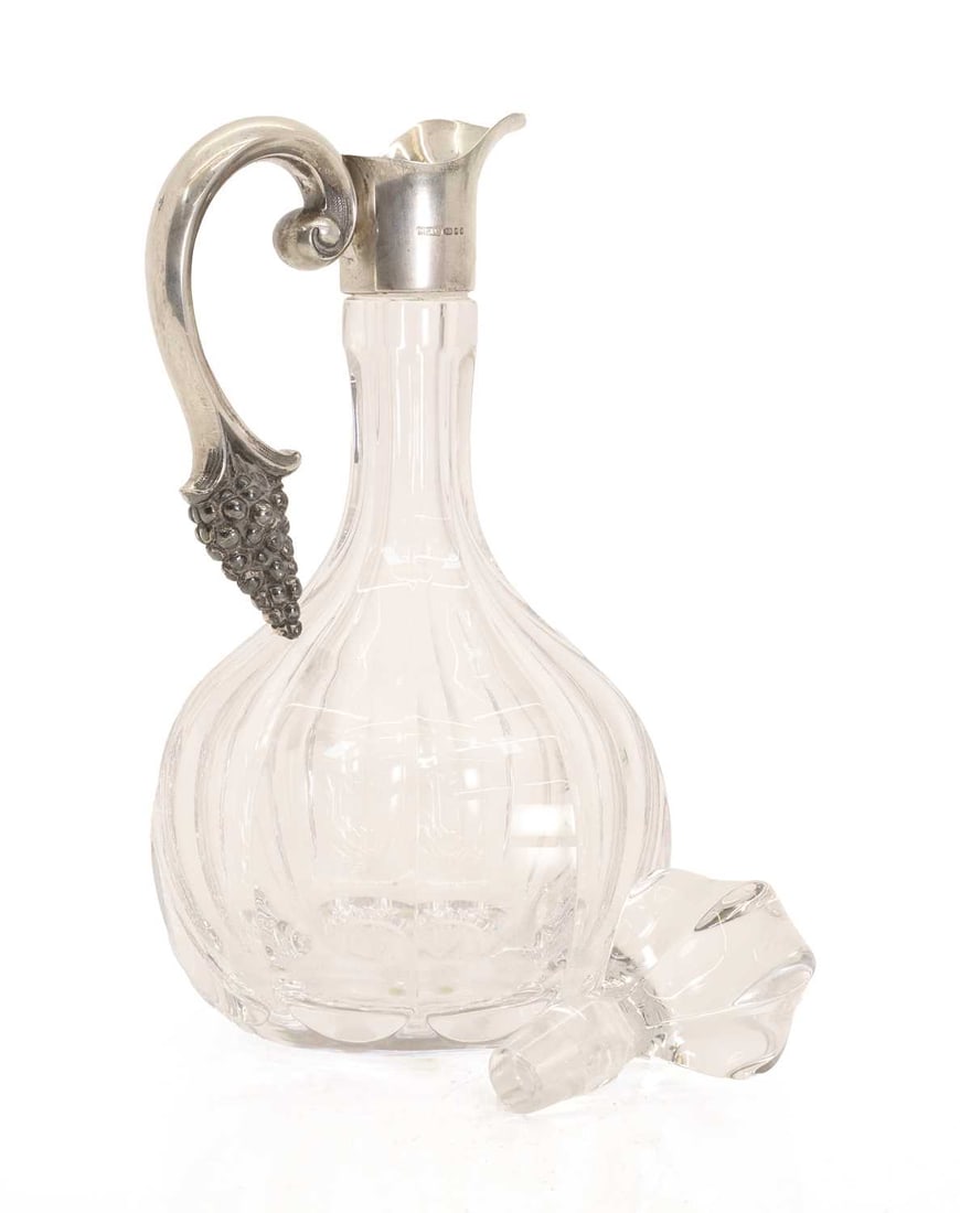 An Elizabeth II silver mounted claret jug, - 2